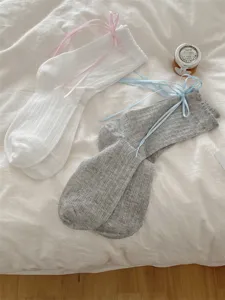 Cute JK style women crew socks with sweet ribbon bows and ruffled lace edges for daily wear