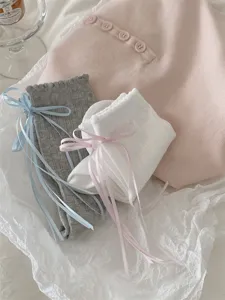 Japanese JK style sweet women mid tube socks with cute bows and lace detail for spring and summer