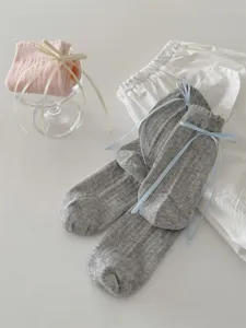 Women sweet JK style ribbon bow mid-tube socks detail view, cute everyday cotton socks.
