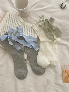 Details of Korean style bow ribbon mid tube socks, sweet Lolita princess daily wear style.