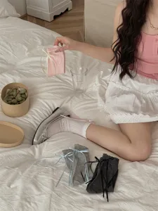 Japanese JK style bow mid-tube socks with sweet ruffles and ribbon ties, perfect for daily wear.