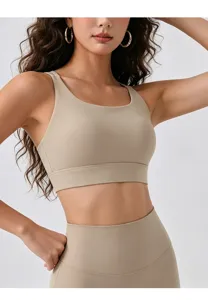 Vista dettagliata del reggiseno sportivo imbottito da donna, top yoga per fitness.