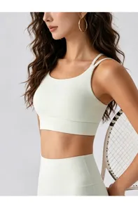 Reggiseno sportivo con spalline sottili dettaglio, top yoga supporto medio fitness donna.