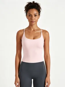 Women's pink athletic tank top with built-in bra, ideal for yoga, fitness and gym workouts.