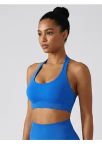 Halter neck sports bra with backless design, breathable fitness yoga vest with padding.