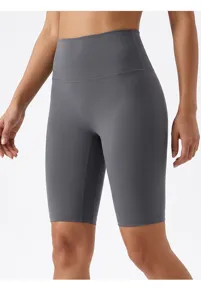 High waist seamless yoga shorts detail shot, dark grey athletic biker shorts for fitness and gym.