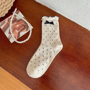 Korean style bow mid-tube socks for women, cute retro polka dot casual cotton hosiery items.