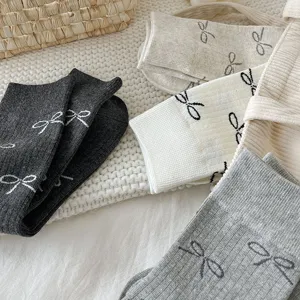Cute bow knit mid-tube socks women cozy grey white beige balletcore aesthetic cotton hosiery.