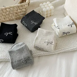 Cute bow mid-tube cotton socks for women, retro ballet style daily casual wear white grey.