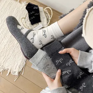 Korean style women mid tube cotton socks with cute bow patterns, cozy grey and white daily wear.