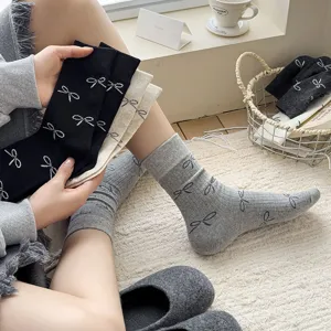 Korean style bow mid-calf socks in grey, black and white, soft cotton daily wear detail.