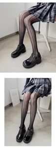 Close-up view of intricate jacquard pattern pantyhose, showing delicate mesh texture.