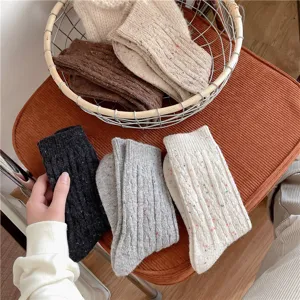 Thickened wool blend crew socks with vintage cable knit pattern and colorful flecks.