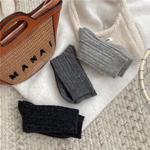 Thick flecked knit mid-tube socks for women, cozy winter warm cable knit hosiery detail.