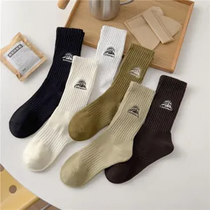 Comfortable mid-tube cotton socks with outdoor mountain camping embroidery, versatile colors for daily wear.