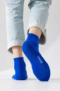 Blue athletic ankle socks with breathable knit sole details, comfortable everyday sports socks.
