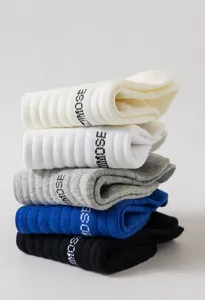 Men's breathable mid-tube cotton socks with stylish letter prints, comfortable five colors.
