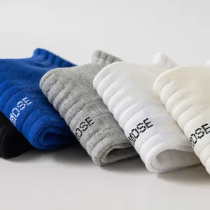 Men's casual athletic short socks in multi-colors with ribbed design and letter print.