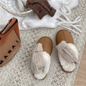Cozy winter plush slippers paired with warm cable knit wool socks for ultimate comfort.