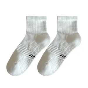 Men's white athletic crew socks with breathable mesh cushioning, perfect for sports and running.