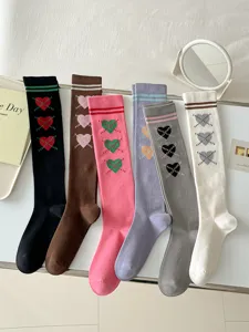 Chaussettes style collège motif losanges et cœurs automne hiver longues chaussettes