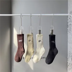 Retro camping style mid tube cotton socks with oil lamp embroidery, four versatile colors available.