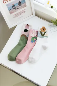 Cute 3D plush floral mid-tube socks for women, sweet Japanese style cotton casual hosiery.