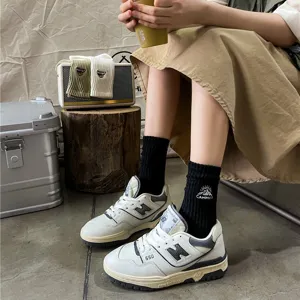 Outdoor camping embroidery mid-tube cotton socks for men and women, stylish and comfortable.