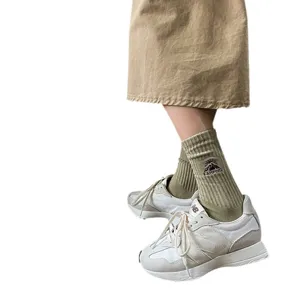 Outdoor camping embroidered mid-tube socks for men and women, stylish breathable cotton sports socks.