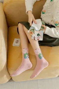 Detailed shot of cute plush floral mid-tube socks in soft cotton, sweet Japanese style.