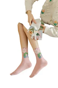 Cute floral mid-tube socks for women, sweet Japanese style pink cotton socks with plush flower decor.