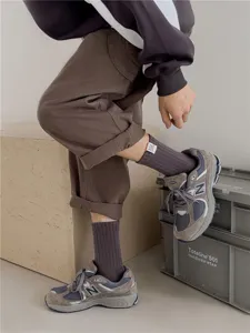 Chaussettes mi-hautes homme automne hiver unies avec étiquette en coton sport style.