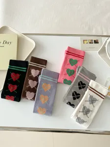 Chaussettes longues style collège français pour femmes, motifs rétro cœurs argyle, mode automne.