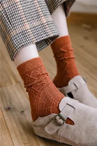 Cozy wool blend vintage mid-tube socks with cable knit diamond pattern for women winter wear.