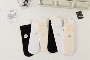 Chaussettes slouch couleur unie femme tube moyen décontractées en coton confortables