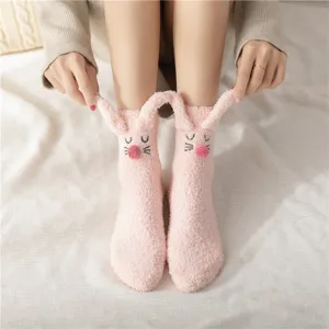Cozy pink fluffy fuzzy socks for women with cute 3d bunny ears warm winter sleep floor socks.