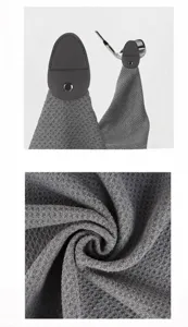 Close-up detail of gray microfiber magnetic golf towel with waffle weave texture