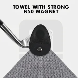 Detailed view of golf microfiber towel with strong N50 magnet attached to a club