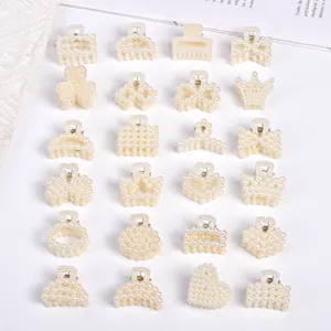 Detailed overview of small pearl hair claws in multiple shapes for elegant hairstyles