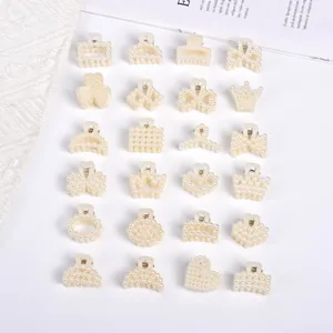Collection of small pearl hair claw clips in elegant heart and crown designs for women