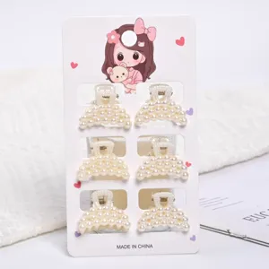 Set of 6 small elegant pearl hair claw clips on decorative display card for daily styling