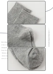 Close-up detail of grey ribbed knit socks showing soft texture, elastic cuff and toe.
