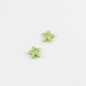 Ciondolo stella marina in lega verde vista di dettaglio per creazione gioielli fai da te.