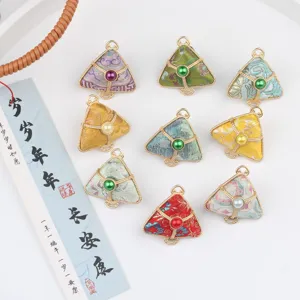 Detailed view of traditional Chinese brocade zongzi charms, colorful DIY pendant accessories.