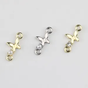 Breloques connecteurs papillon en alliage doré et argenté avec perles et strass pour bijoux DIY.