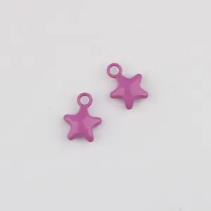 Close-up detail shot of purple star alloy pendants for custom DIY jewelry making accessories.