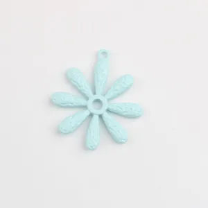 Light blue alloy painted daisy flower pendant charm for DIY jewelry accessory detail.