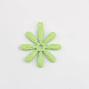 Green alloy daisy pendant detail, cute floral charm for DIY handmade jewelry and necklaces making.