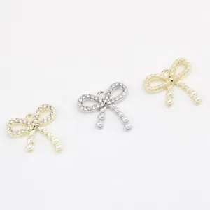 Alloy pearl rhinestone bow pendants for DIY jewelry making, bracelets, necklaces, and earrings.