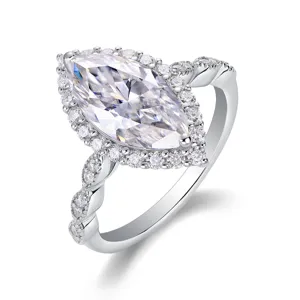 Detailed view of S925 silver marquise moissanite halo ring with twisted pave band.